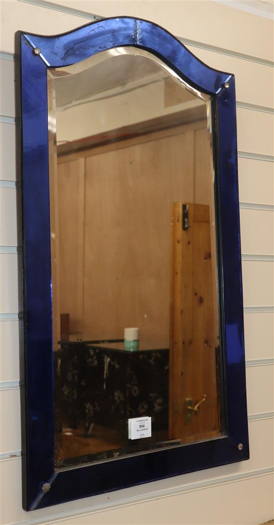 An Art Deco style blue glass framed wall mirror H.76cm